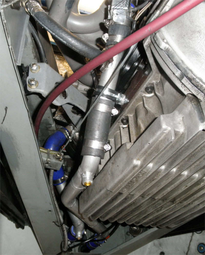Picture of the engine coolant pipe near engine